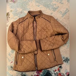 Active USA size medium. Carmel color with gold zippers. Side pockets.